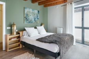 Posteľ alebo postele v izbe v ubytovaní Val Arties 3 by FeelFree Rentals