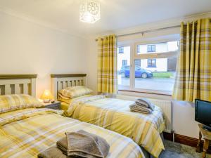 Katil atau katil-katil dalam bilik di 3 Bed in Langtree 79041