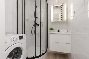 Kúpeľňa v ubytovaní Apartments City Center by Noclegi Renters