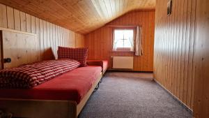 Postel nebo postele na pokoji v ubytování Gasthaus Rössli