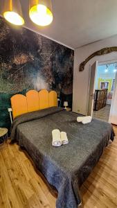 Кровать или кровати в номере MILAZZO PORT rooms