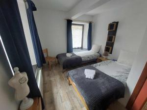 Postel nebo postele na pokoji v ubytování Le Vieux La Roche