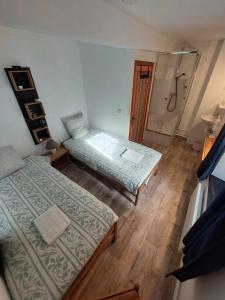 Postel nebo postele na pokoji v ubytování Le Vieux La Roche