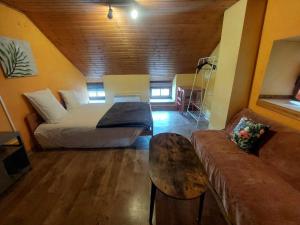 Postel nebo postele na pokoji v ubytování Le Vieux La Roche