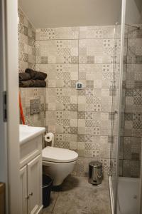 Phòng tắm tại Apartament Komnata