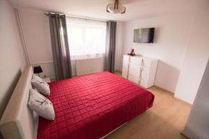 Posteľ alebo postele v izbe v ubytovaní Apartament Zacisze Tatr
