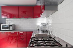 Kuchyňa alebo kuchynka v ubytovaní Apartament Zacisze Tatr