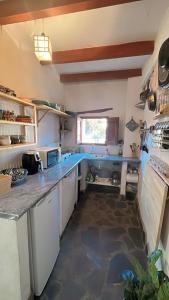 Nhà bếp/bếp nhỏ tại Casa Peggy