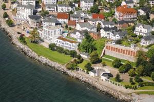 an aerial view of a town next to the water at Ostseeresidenz Sassnitz - Penthouse 20 mit Sauna, Balkon, Meerblick in Sassnitz +9 photos