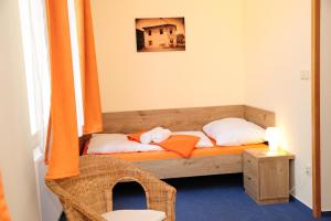 Posteľ alebo postele v izbe v ubytovaní Hotel Praha Potštejn