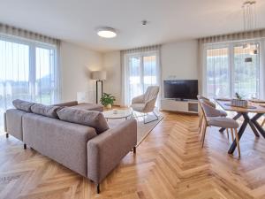 TV a/nebo společenská místnost v ubytování Hermitage Vital Hotel