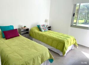 Postel nebo postele na pokoji v ubytování Tierra Alta, Comarca Serrana