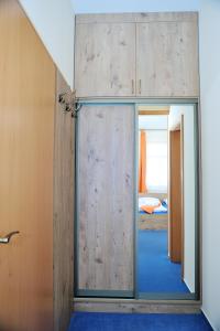 Posteľ alebo postele v izbe v ubytovaní Hotel Praha Potštejn