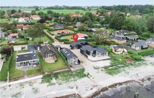 an aerial view of a house on the beach at Lille Rn in Nyborg