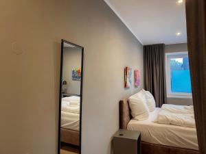 Postel nebo postele na pokoji v ubytování Apartment Prinzessin Aphrodite - inkl Disney - Zimmerprinzen