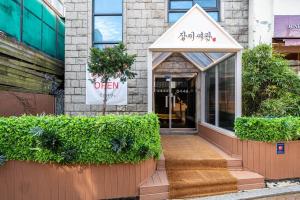 a entrance to a store with a sign on it at Rose motel in Seoul
