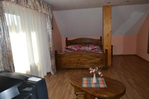Postel nebo postele na pokoji v ubytování Motelis Aka