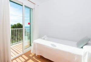 Postel nebo postele na pokoji v ubytování Villa Mirador A by Sonne Villas + 47 fotografií