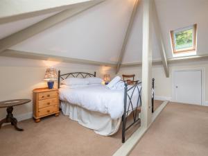En eller flere senger på et rom på 4 Bed in Aberdovey DY038