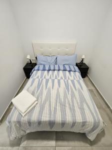Krevet ili kreveti u jedinici u okviru objekta Apartamentos La Meridian