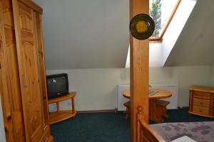 TV a/nebo společenská místnost v ubytování Motelis Aka