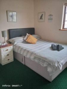 Postel nebo postele na pokoji v ubytování Edwards Cosy B&B