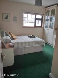 Postel nebo postele na pokoji v ubytování Edwards Cosy B&B