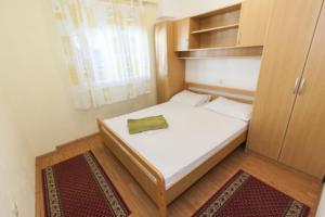 Llit o llits en una habitació de Apartment Mikulić