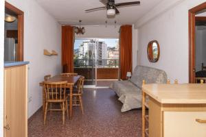 a living room with a couch and a table at Florazar 2, Vi-5-B in Cullera