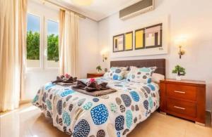 a bedroom with a large bed with towels on it at Villa Luna in Yaiza +14 photos