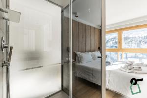 Postel nebo postele na pokoji v ubytování HOTIDAY Room Collection - Cervinia