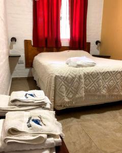 Postel nebo postele na pokoji v ubytování Cabañas El Chogüí