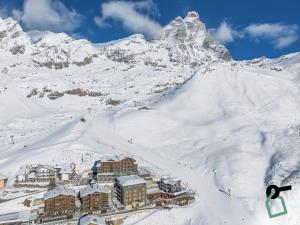 HOTIDAY Room Collection - Cervinia v zimě