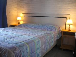 Łóżko lub łóżka w pokoju w obiekcie Altos de La Balconada