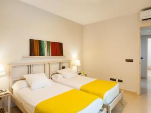 Ένα ή περισσότερα κρεβάτια σε δωμάτιο στο Birdie 13 by VillaGranCanaria +19 φωτογραφίες