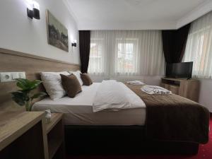 Postel nebo postele na pokoji v ubytování Hotel Nacional Free Parking + 37 fotografií