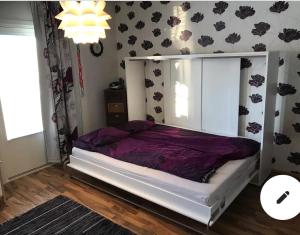 Postel nebo postele na pokoji v ubytování Lapland Second Home + 4 fotografie