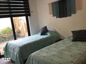 Postel nebo postele na pokoji v ubytování Villa Constantino