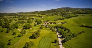 an overhead view of a park with trees and a road at Conero Guest House in Numana