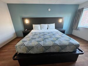 Postel nebo postele na pokoji v ubytování Motel 6 East Syracuse, NY - Airport