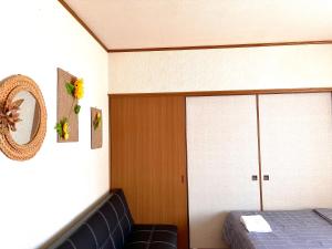 Llit o llits en una habitació de PENSION YunShuiYao雲水瑶民宿