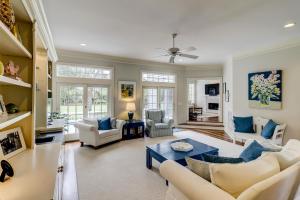 a living room with a couch and a table at 317 Glen Eagle in Kiawah Island