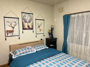 Llit o llits en una habitació de PENSION YunShuiYao雲水瑶民宿