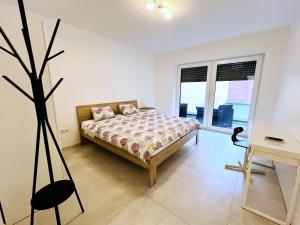 Postel nebo postele na pokoji v ubytování Appartement - Rue du Canal