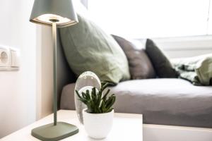 Postel nebo postele na pokoji v ubytování Smart Living Dornbirn + 13 fotografií