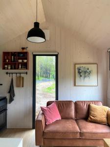 Posezení v ubytování Bjarmaland Cottages