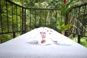 Una cama o camas en una habitación de Acuali EcoHostal