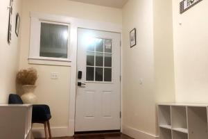 a white door in a room with a window at Comfy 4 Bed 1 Bath w/ Wi-fi in College Area in Springfield
