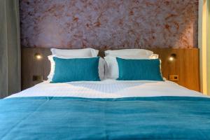 Sable Bleu Boutique Hotel客房内的一张或多张床位