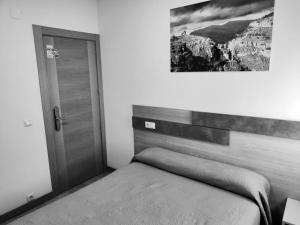 Postel nebo postele na pokoji v ubytování Hostal Rioja Condestable